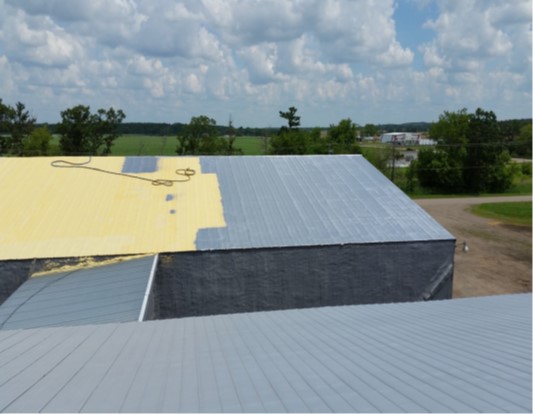 Potato storage building roof restored with a sprayed membrane