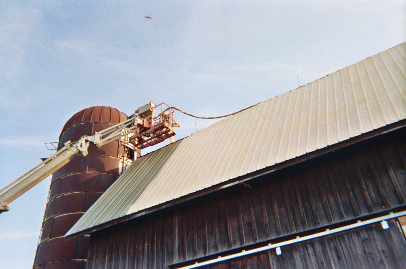 Spray foam applied to a barn roof assembly